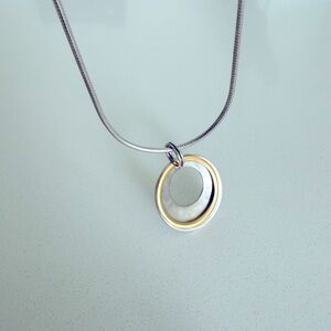Elegant Silver and Gold Pendant Necklace